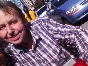 My dad in front of his house.. and my car. :)