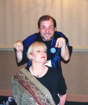 John Everson standing behind Charlee Jacobs